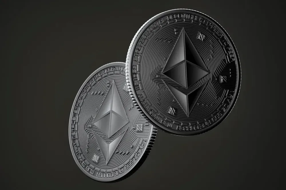 Two coins with the Ethereum logo, one silver and one black, floating against a dark grey background.